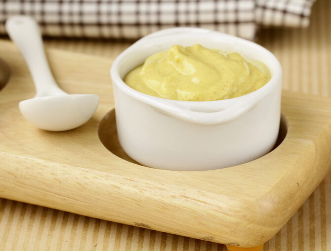 french-mustard-sauce-in-white-gravy-boat